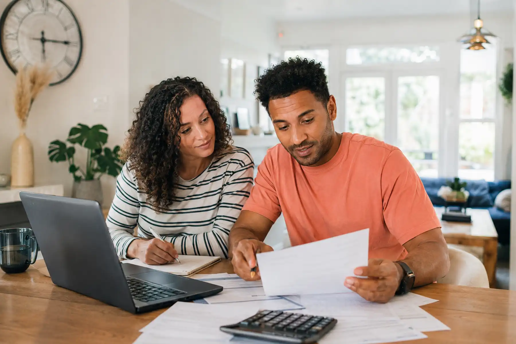 Homeowners reviewing mortgage payment protection insurance.